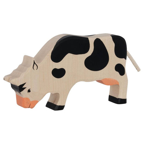 Cow, grazing, black