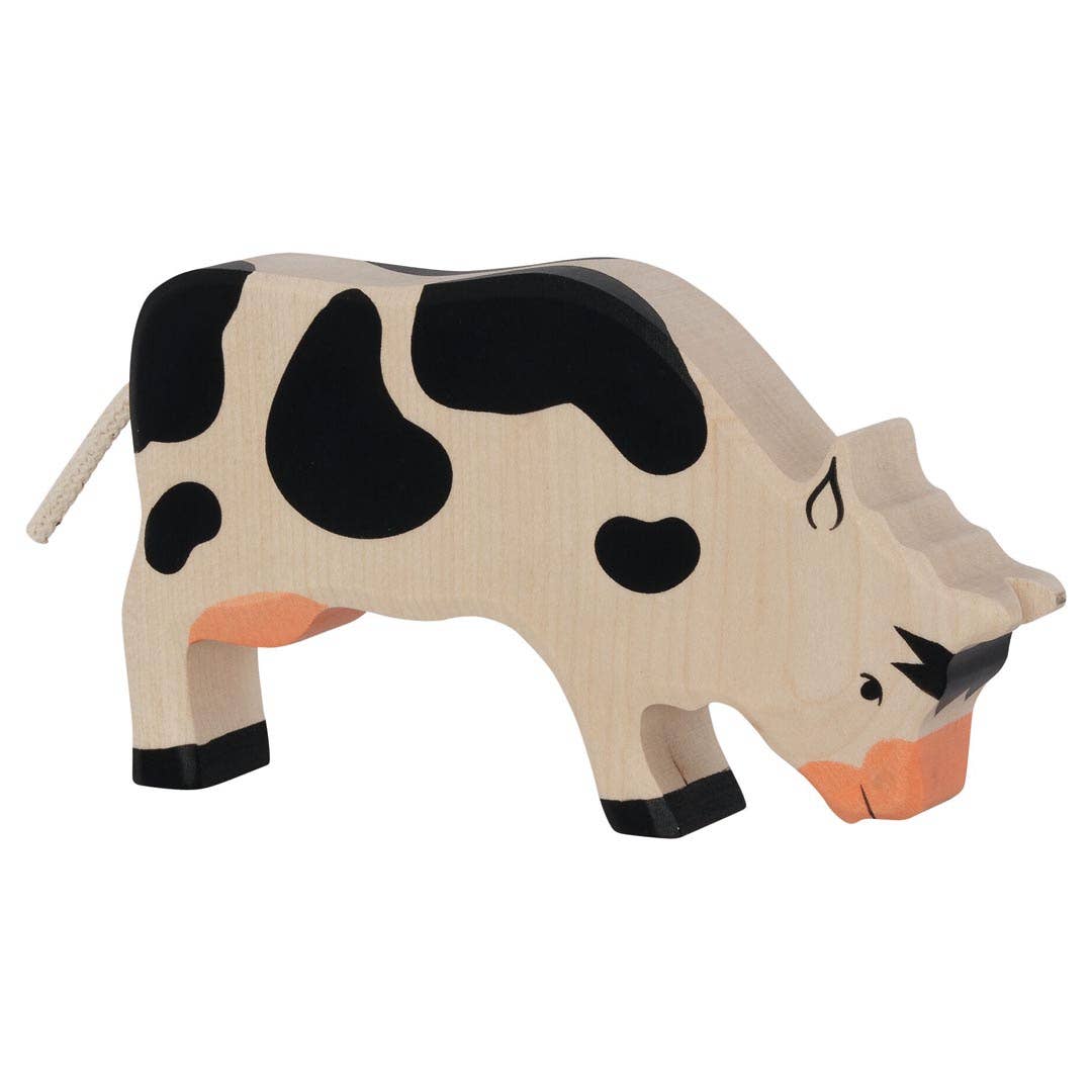 Cow, grazing, black